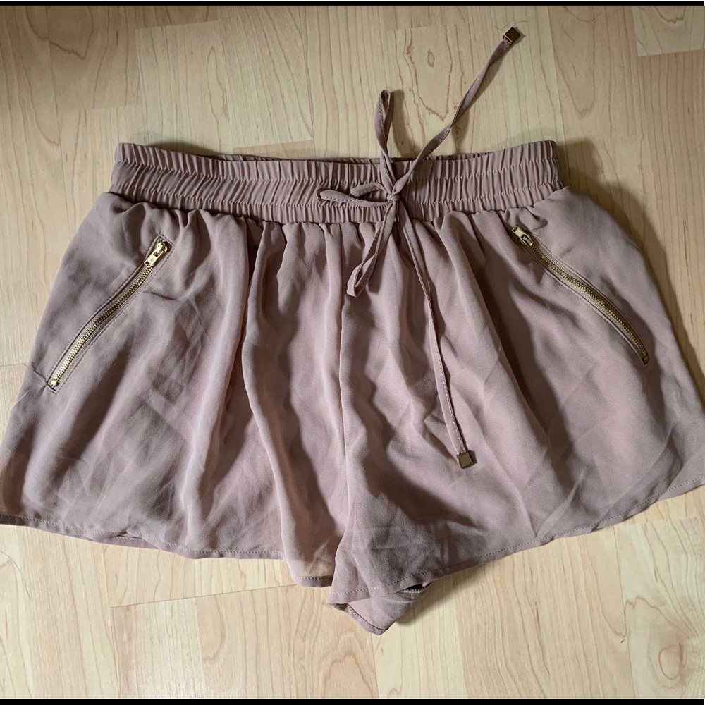 Kinnucan’s light brown shorts (never worn)